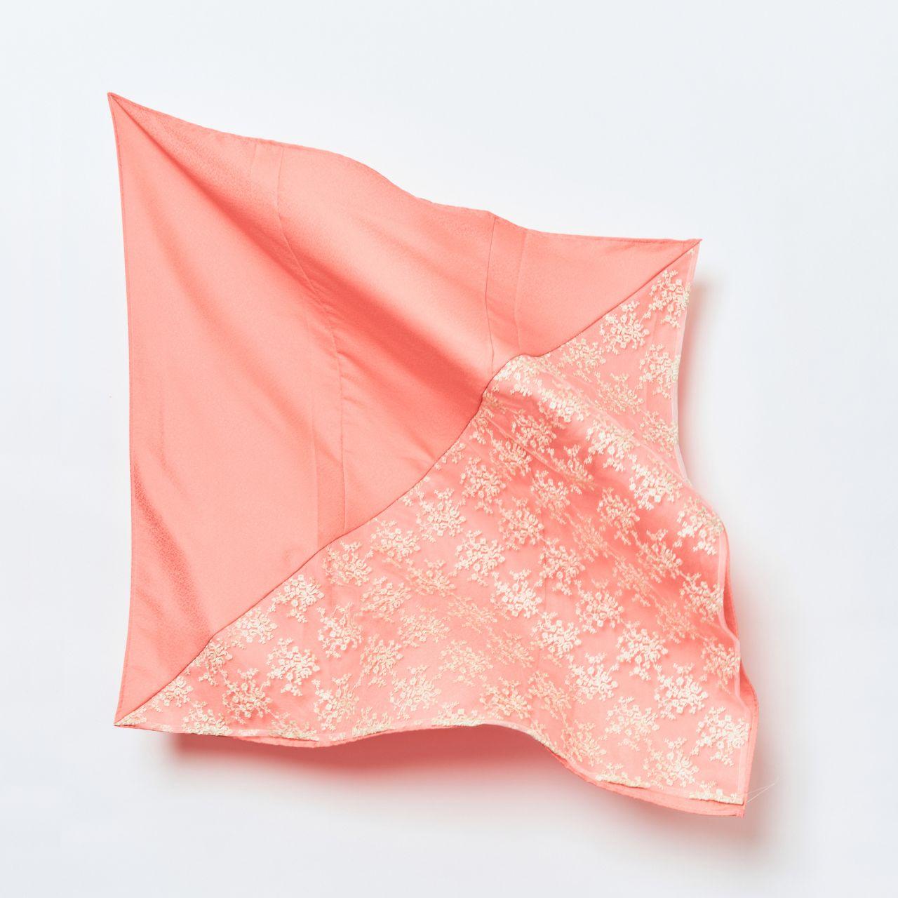 Full display of a luxury coral pink hijab upcycled from vintage Japanese Kimono silk, featuring elegant lace-like floral embroidery and a rich, lustrous texture.