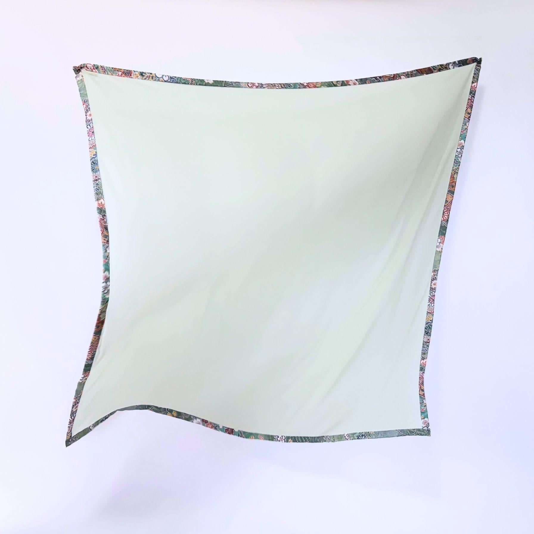 Alternative angle of Awakening Spring silk scarf hijab, highlighting the soft drape and fresh spring morning colors of upcycled vintage silk.
