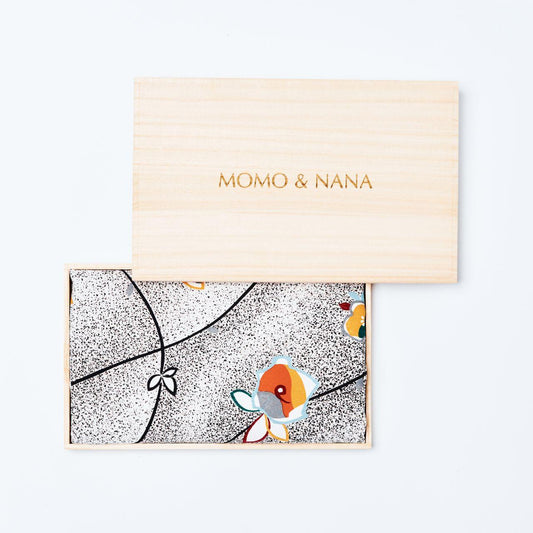 Premium "BUDDING MORNING" silk hijab by MOMO & NANA, presented in a traditional Japanese handcrafted paulownia wood box for an exquisite gifting experience.