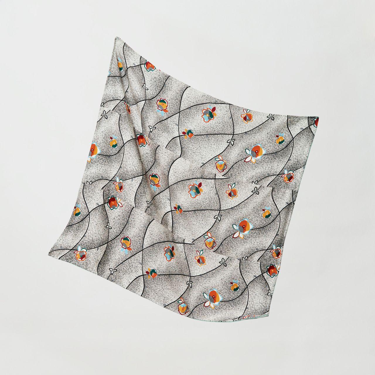 Full view of "BUDDING MORNING" headscarf featuring a sophisticated upcycled vintage Kimono pattern with orange and turquoise floral motifs on a monochrome stippled background.