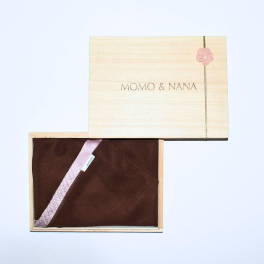 "Earth and Bloom: Brown sheer kimono hijab with a distinct pink line accent in a traditional Japanese paulownia wood gift box. 100% vintage silk.
