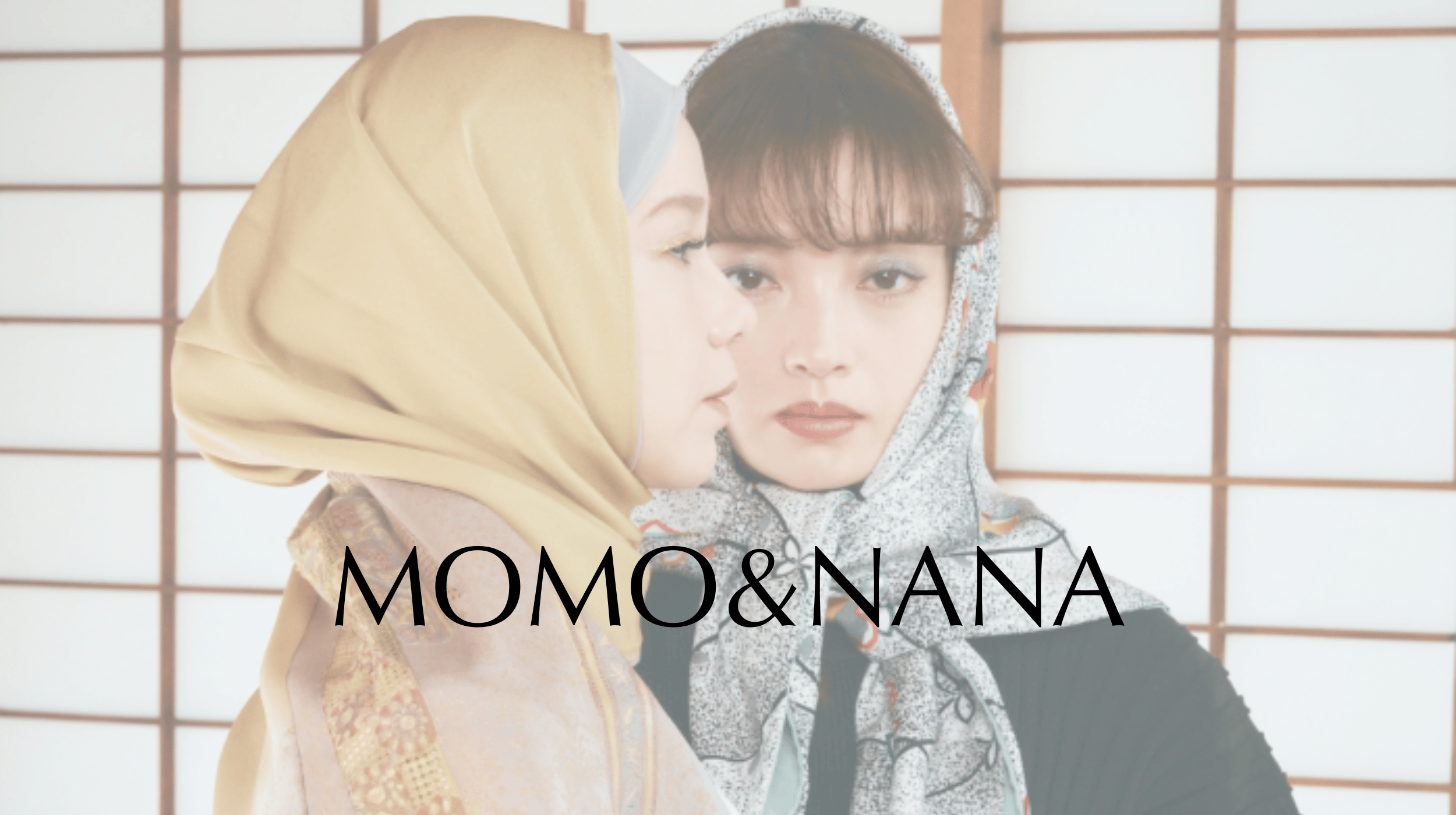 A model wearing a MOMO & NANA 100% silk Kimono Hijab made from upcycled Furisode, handcrafted in Japan.