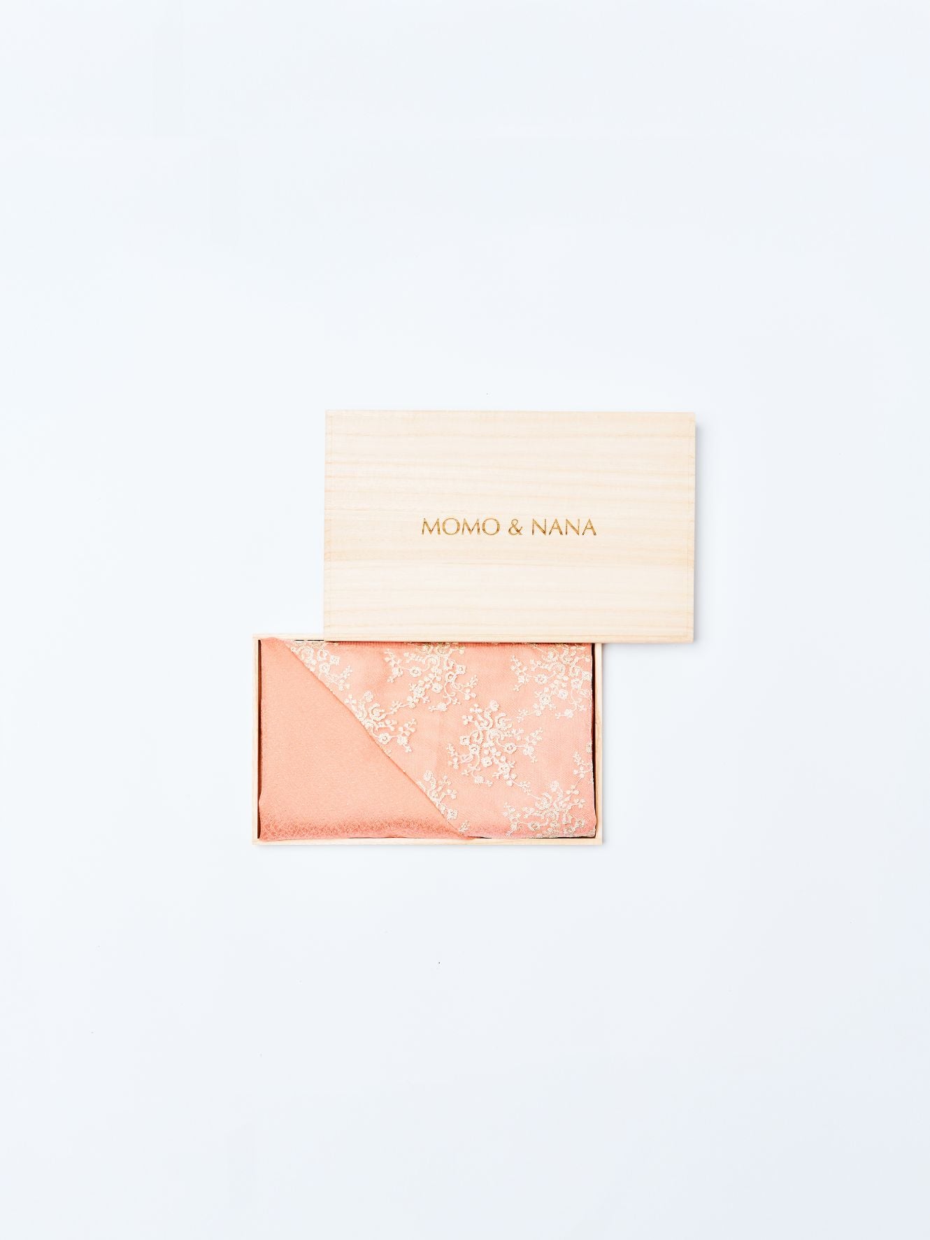 Traditional Japanese Kiri Box packaging for MOMO & NANA silk hijabs, designed for elegant preservation and luxury gifting.